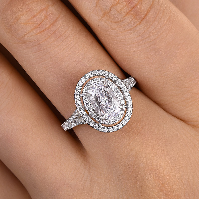 ER1048PS-2 S925 Luxury Split Shank Double Halo Oval Cut Engagement Ring In Sterling Silver - Image 1
