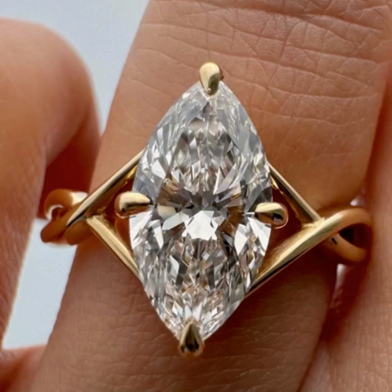 ER1880YMSS-2-6AMEwA S925 Moissanite Twist 3.0Ct Marquise Cut Yellow Gold Engagement Ring - Image 1