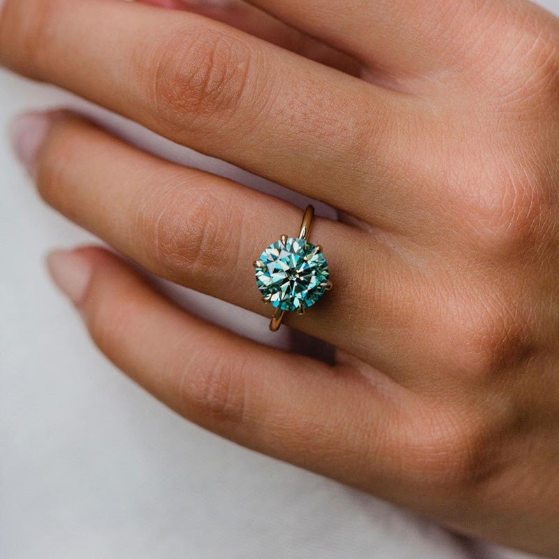 ER641-3 S925 Moissanite Round Cut Paraiba Tourmaline Engagement Ring - Image 1