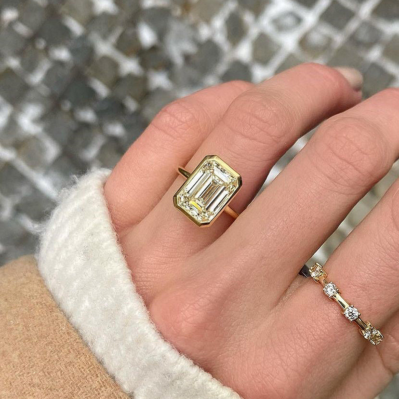 ER796YS-2 S925 Unique Yellow Gold Emerald Cut Bezel Engagement Ring In Sterling Silver - Image 1