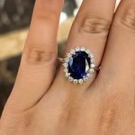 S925 Luxurious Halo Oval Cut Blue Sapphire Engagement Ring In Sterling Silver
