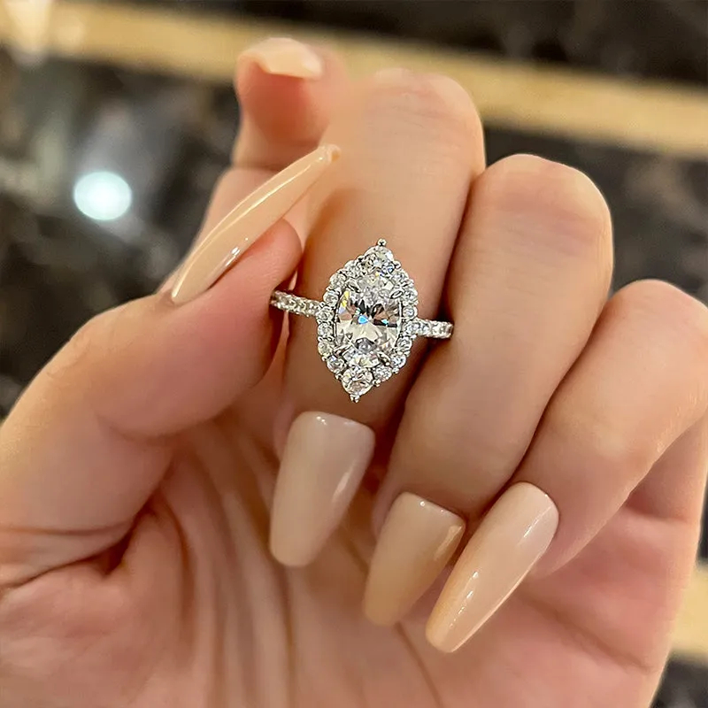 Unique-Design-2-0-Carat-Oval-Cut-Engagement-Ring-In-Sterling-Silver-Maxinejewelry-1 S925 Unique Design Halo Oval Cut Sona Simulated Diamond Engagement Ring In Sterling Silver - Image 1